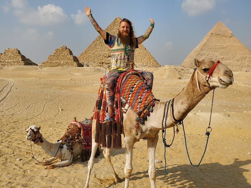 dante starshine riding a camel